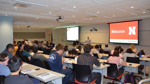 Students in a large auditorium