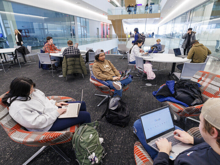 Students studying a lounge